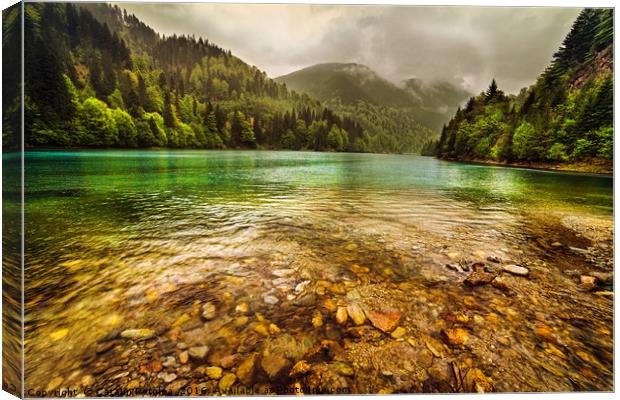 Lake in mountains, in a rainy day Canvas Print by Ragnar Lothbrok