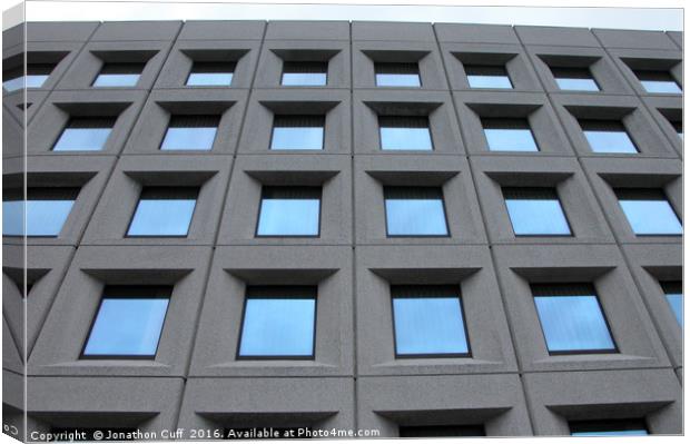 Sky reflecting across a patchwork of windows Canvas Print by Jonathon Cuff