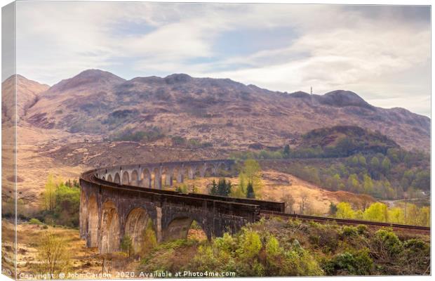 Majestic Glenfinnan Viaduct in the Scottish Highla Canvas Print by John Carson