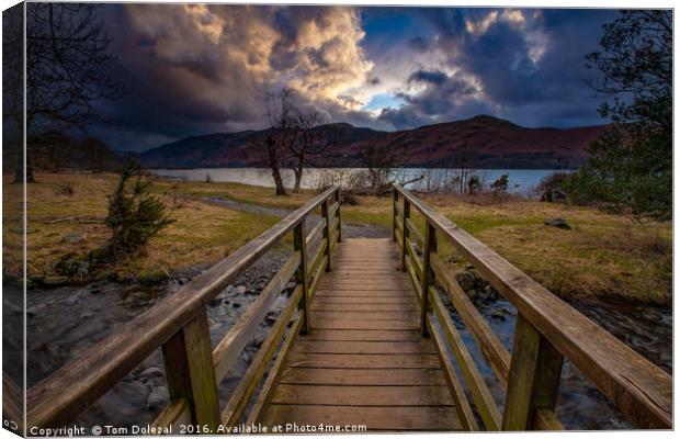 Dusk view across the bridge Canvas Print by Tom Dolezal