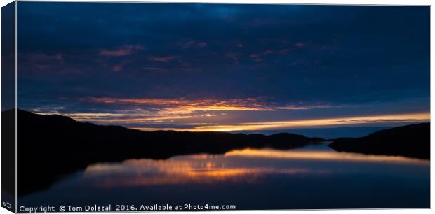 Reflections of a Highland sunset Canvas Print by Tom Dolezal