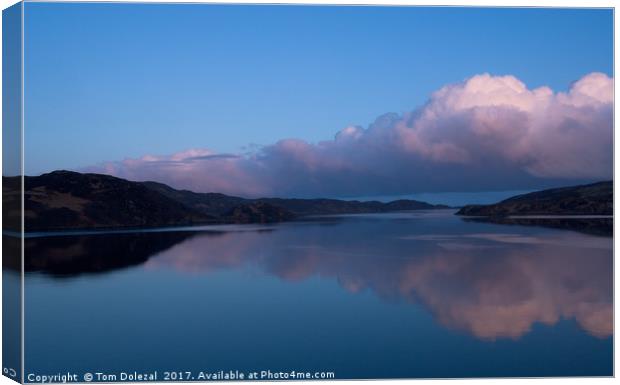 Clouds over the loch. Canvas Print by Tom Dolezal