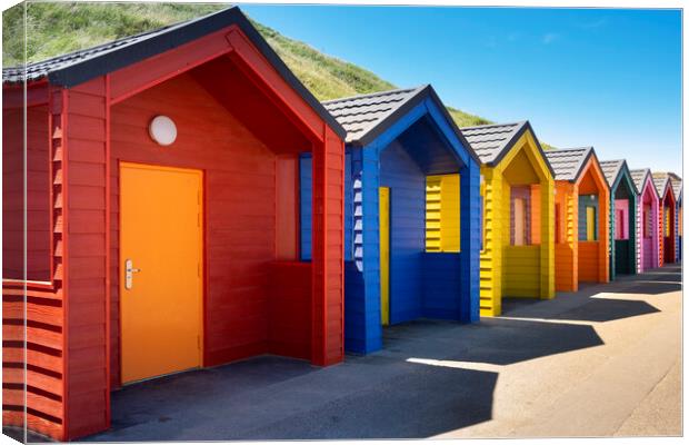 Happy days, Saltburn beach huts colour explosion Canvas Print by Jeanette Teare