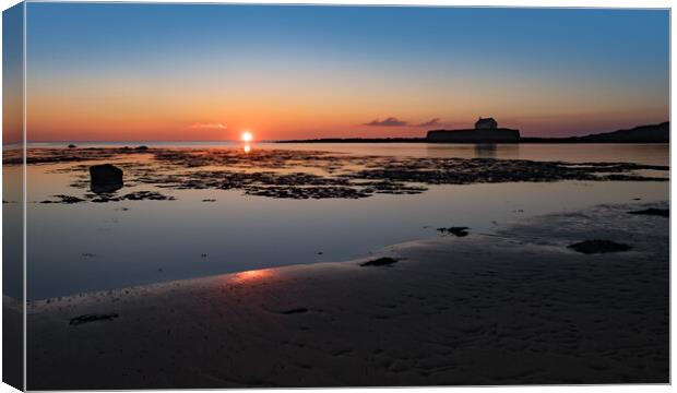 Mystical sunset at Cwyfan, Aberffraw Canvas Print by Jeanette Teare