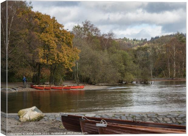 Orange boats at Coniston Water Canvas Print by JUDI LION