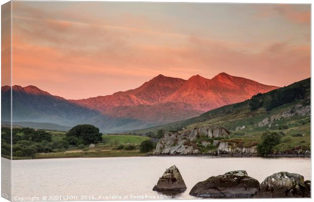 Red sunrise on the Snowdon Horseshoe Canvas Print by JUDI LION