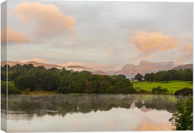 Sunrise at Loughrigg Tarn in Lake District Canvas Print by Steve Heap