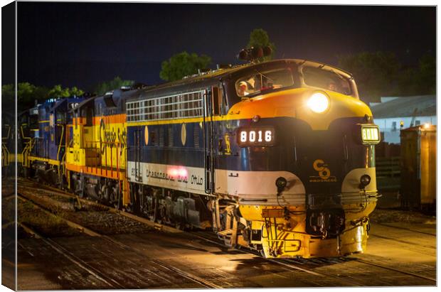 Diesel railroad engine at night Canvas Print by Steve Heap