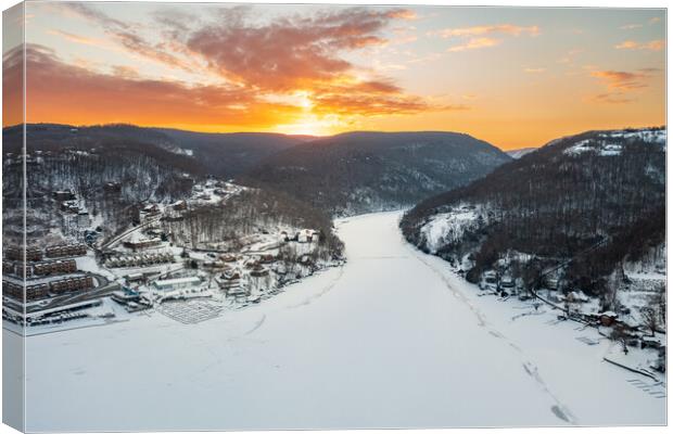 Aerial sunrise over frozen Cheat Lake Morgantown, WV Canvas Print by Steve Heap