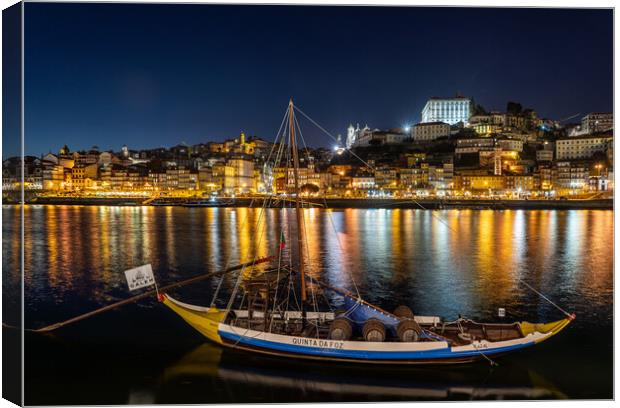 Rabelo boats of Porto in Portugal at night Canvas Print by Steve Heap