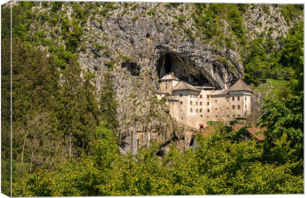 Predjama castle built into a cave in Slovenia Canvas Print by Steve Heap