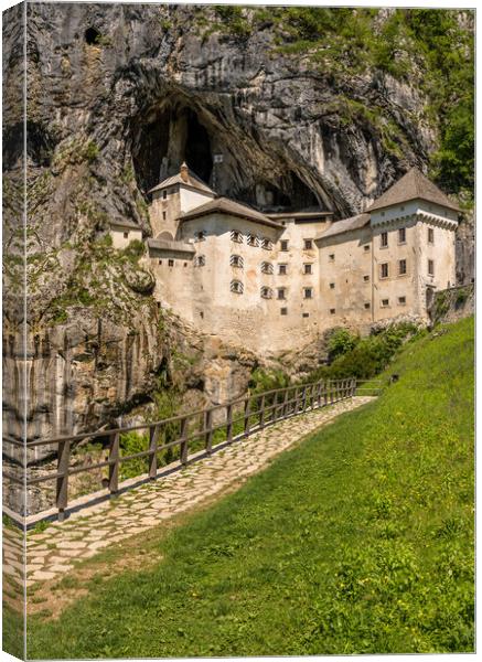 Predjama castle built into a cave in Slovenia Canvas Print by Steve Heap