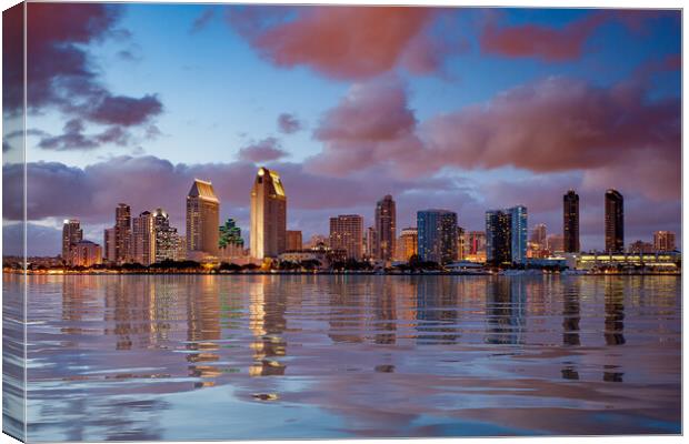 San Diego skyline at dusk reflected in sea Canvas Print by Steve Heap