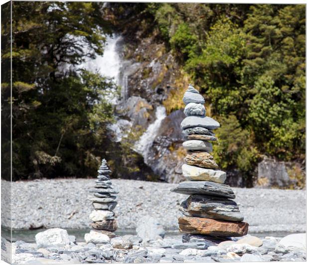 Stone Piles at Fantail Falls, New Zealand Canvas Print by Jackie Davies