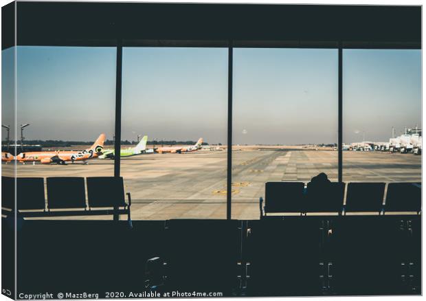 Looking out across the runway Canvas Print by MazzBerg 