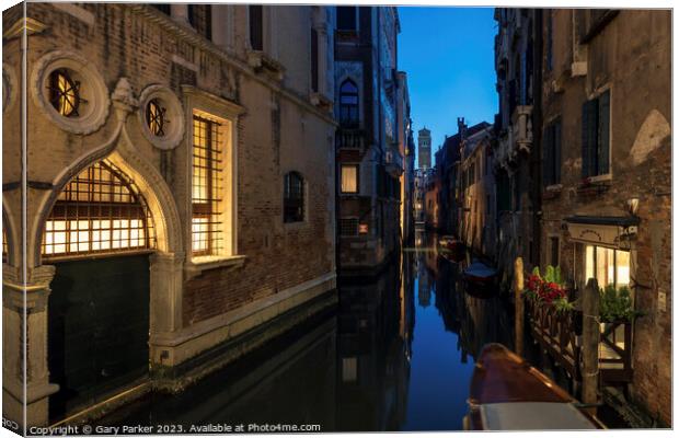 Venetian canal at night time Canvas Print by Gary Parker