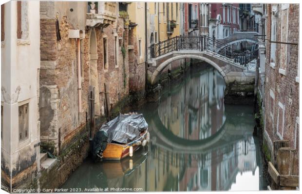 Typical Venetian canal, early in the morning. Canvas Print by Gary Parker