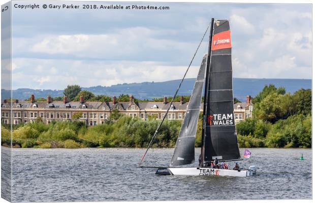 A Team Wales catamaran sails in Cardiff Bay, Wales Canvas Print by Gary Parker