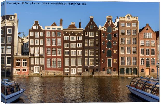 Tall Dutch houses, overlooking an Amsterdam canal Canvas Print by Gary Parker