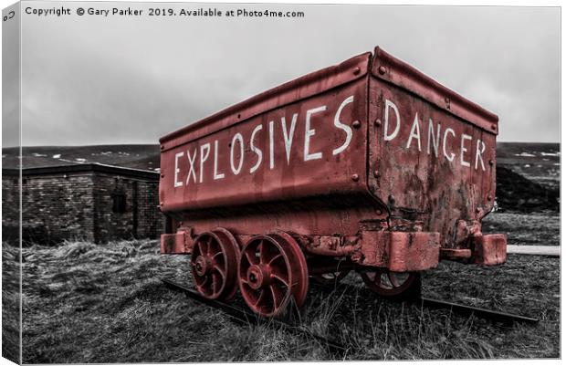 A bright red, weathered, mine cart Canvas Print by Gary Parker