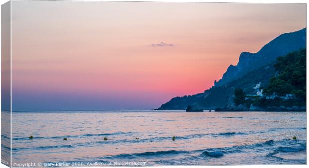Sunset over a beach in Corfu, Greece	 Canvas Print by Gary Parker