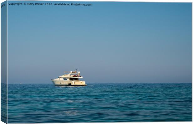 A large motorboat, in the Mediterranean sea, on a summers day	 Canvas Print by Gary Parker