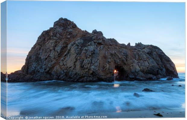 The Arch Rock Canvas Print by jonathan nguyen