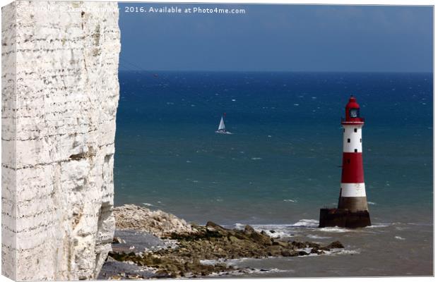 Beachy Head Lighthouse and sailing boat Canvas Print by James Brunker