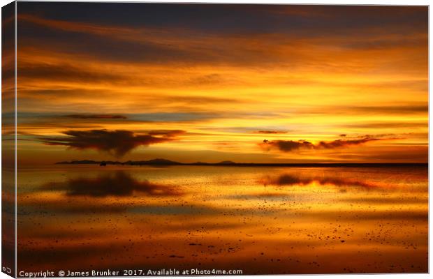 Sunset Reflections on the Salar de Uyuni Bolivia Canvas Print by James Brunker