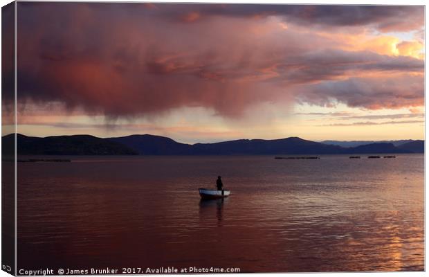 Stormy Sunset and Fisherman on Lake Titicaca Canvas Print by James Brunker