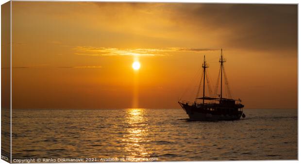 Sailing boat at sunset Canvas Print by Ranko Dokmanovic