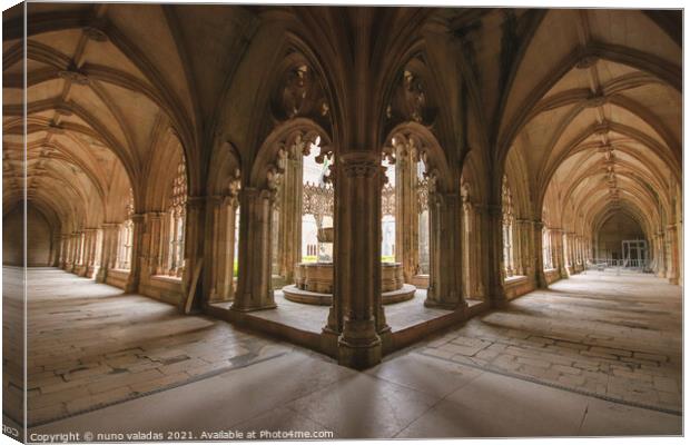 Archway of an old monastery. Cloisters of Batalha Monastery Canvas Print by nuno valadas