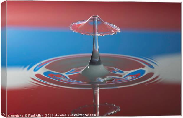 water drop collision in red white and blue Canvas Print by Paul Allen