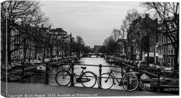 2 bicycles and a Canal Canvas Print by Zac Magner
