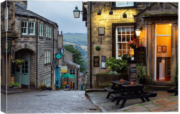 The Black Bull Public House at the top of Main Street, Haworth, Yorkshire.  Canvas Print by Ros Crosland