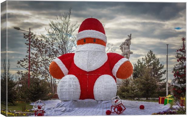 The Incredible Giant Santa Smiley Puppet Doll Canvas Print by Marcel de Groot
