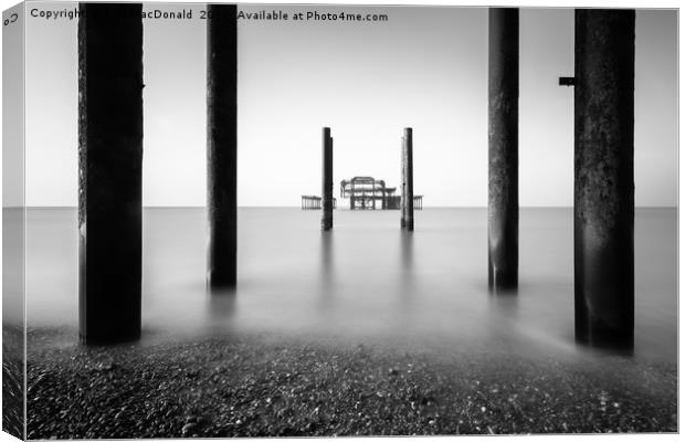 The Old West Pier, Brighton and Hove Canvas Print by Phil MacDonald