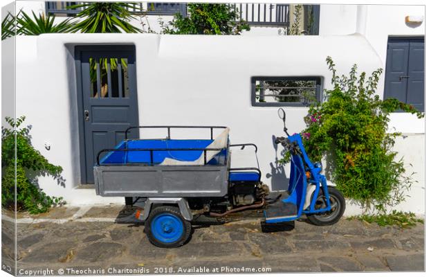 Motor tricycle parked against whitewashed house. Canvas Print by Theocharis Charitonidis