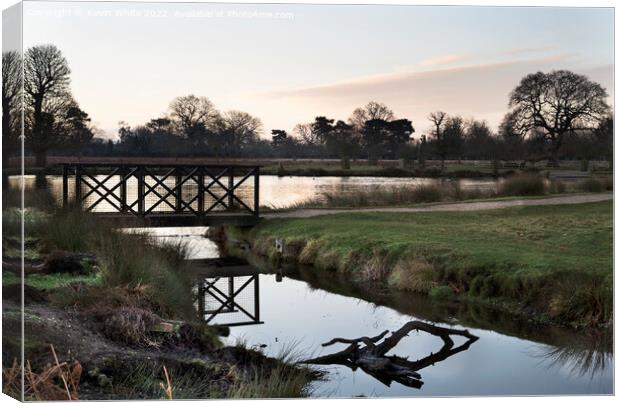 Bridge and stream Canvas Print by Kevin White