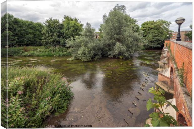 River flowing under Leatherhead bridge Canvas Print by Kevin White