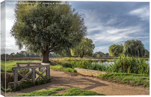 Circular walk around Bushy Park ponds Canvas Print by Kevin White