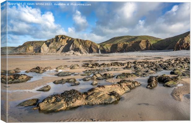 Sandymouth Bay beach and rock formations Canvas Print by Kevin White