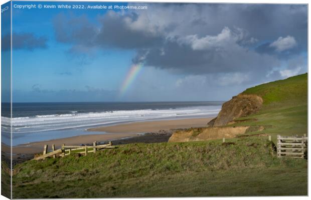 Rain and sun at Sandymouth Beach Canvas Print by Kevin White