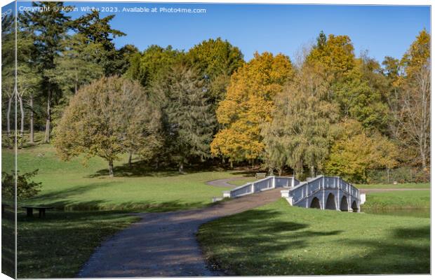 Five arch bridge at Painshill gardens in autumn Canvas Print by Kevin White