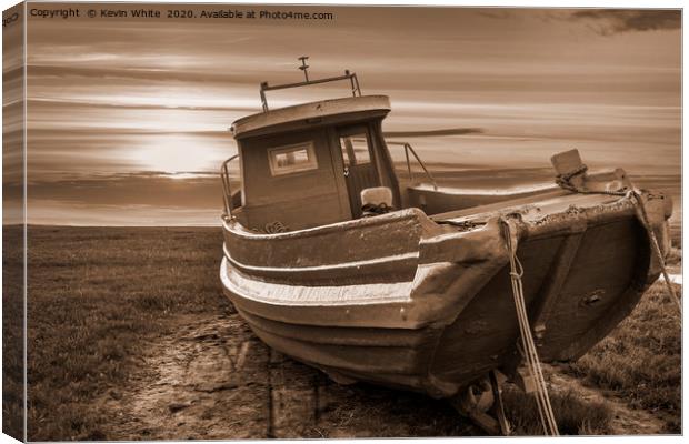 old fishing boat in sepia Canvas Print by Kevin White