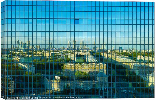 City reflecting in office building Canvas Print by Łukasz Szczepański