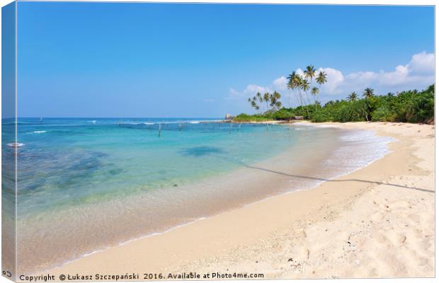 Sandy beach by emerald Indian Ocean Canvas Print by Łukasz Szczepański