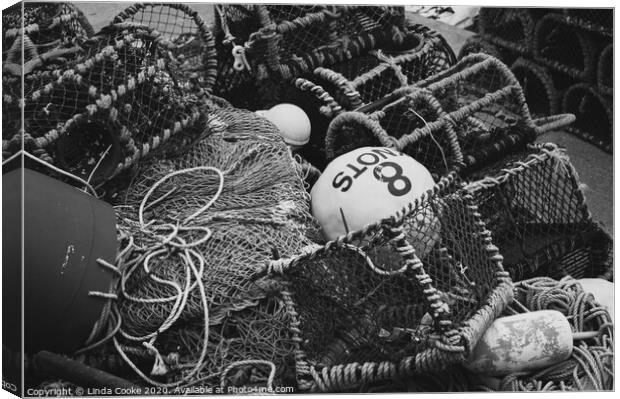 Fishing pots and nets Canvas Print by Linda Cooke