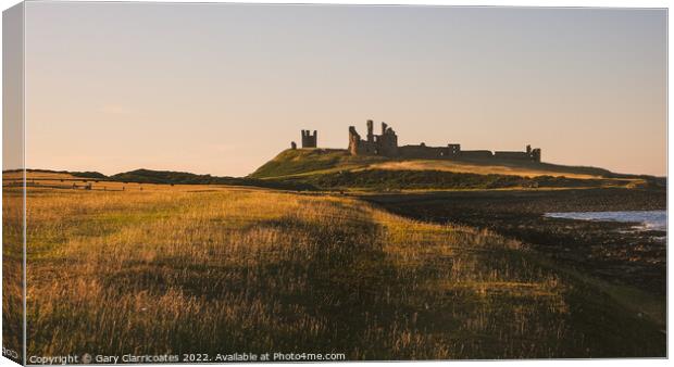 The Walk to Dunstanburgh Castle Canvas Print by Gary Clarricoates