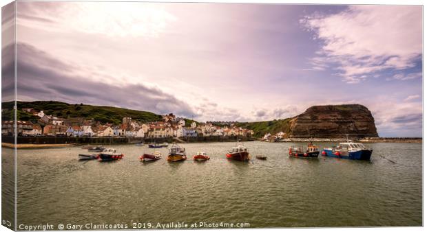 Protecting Staithes Canvas Print by Gary Clarricoates